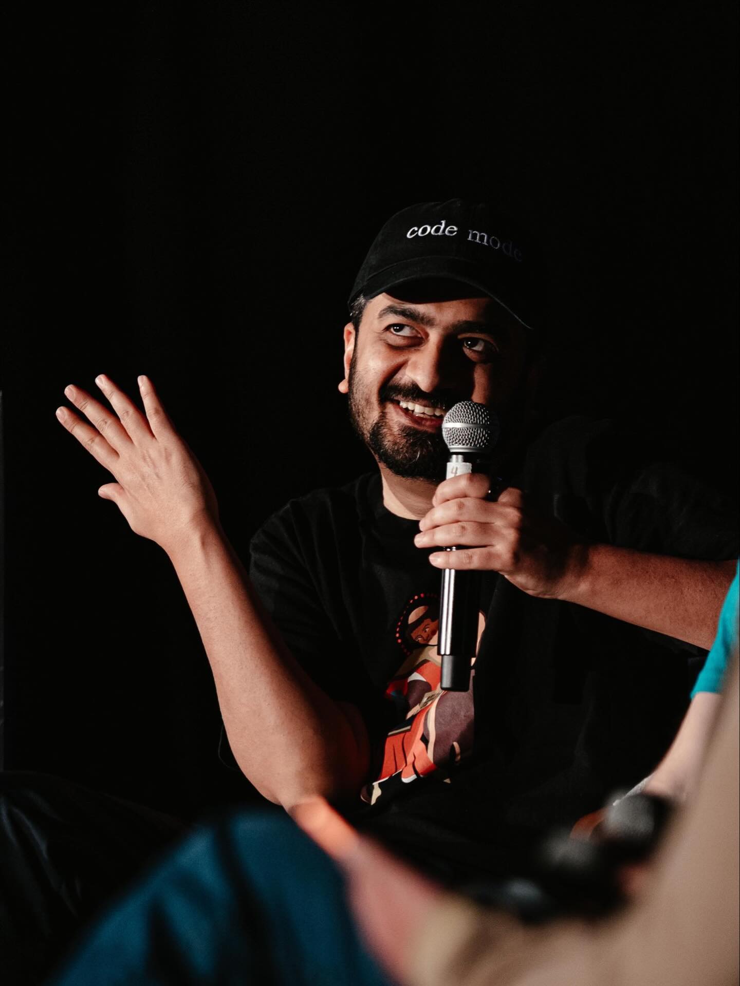 Sunil Pai smiling and speaking into a microphone